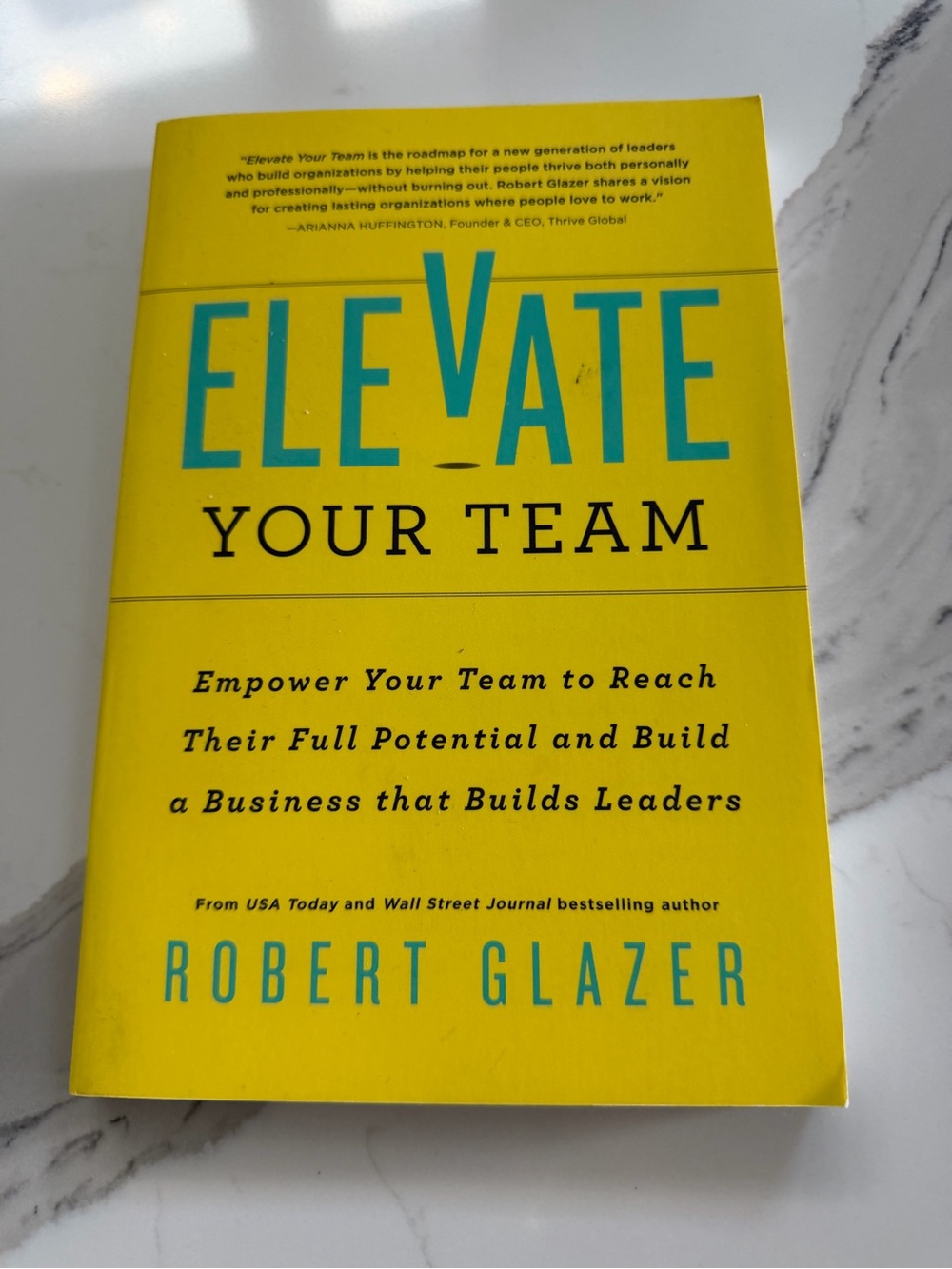 Elevate Your Team by Robert Glazer - Yellow Paperback
